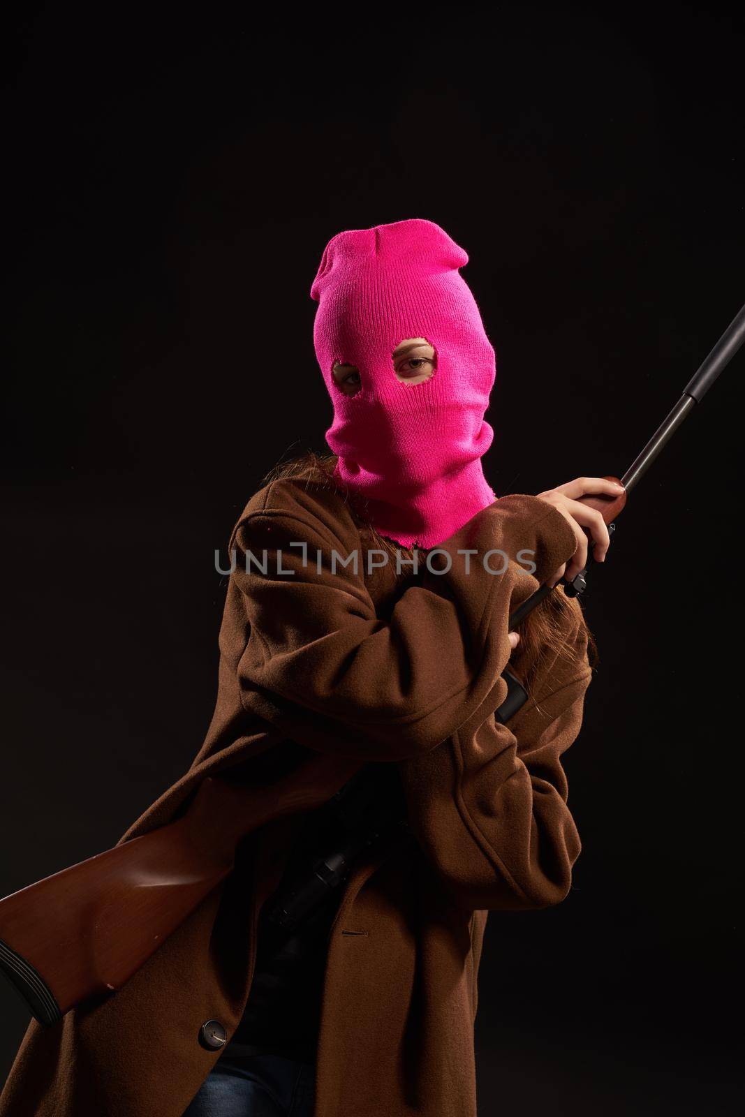 woman grandstage danger the gun posing Military. High quality photo