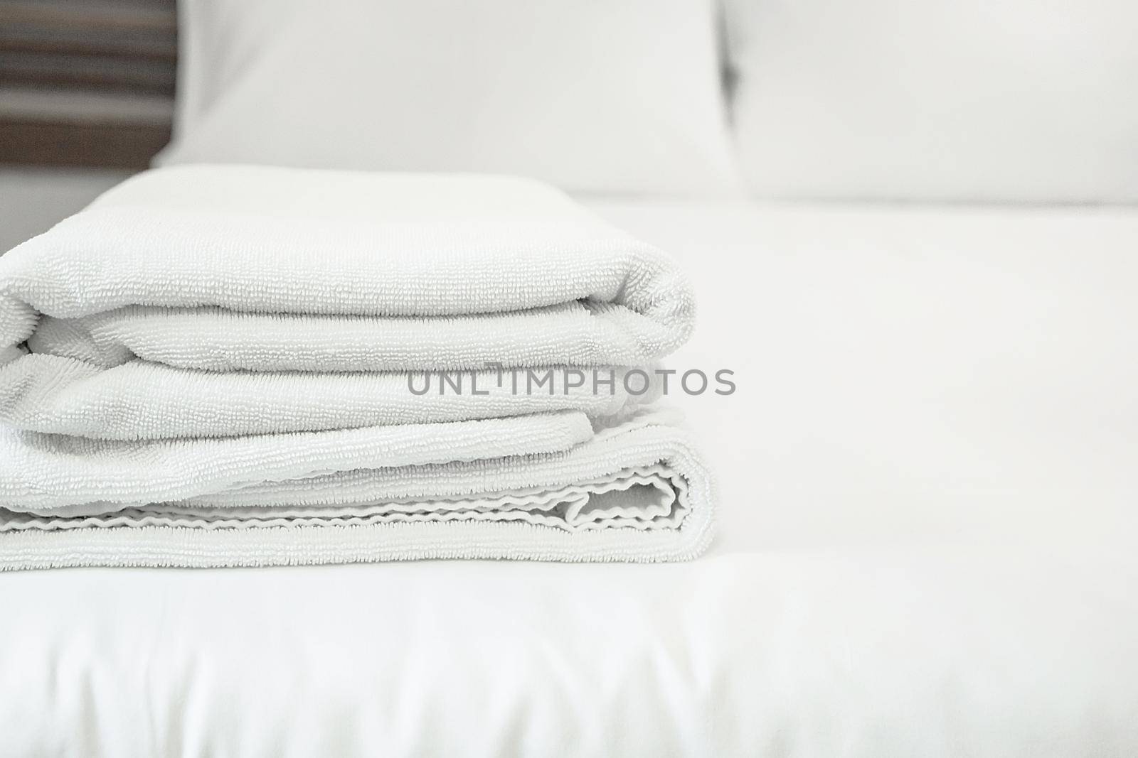 white towel on white mattress fabric, soft light in the morning by rakoptonLPN