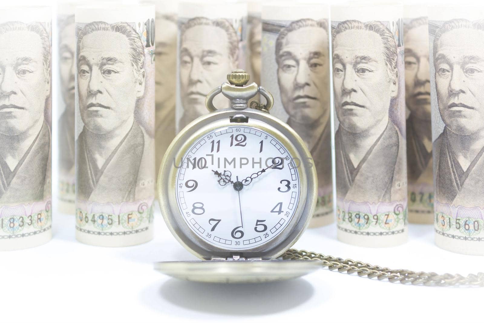 Classic Pocket Watch On Dollar Banknote, Concept And Idea Of Time Value And Money, Business And Finance Concepts. by rakoptonLPN