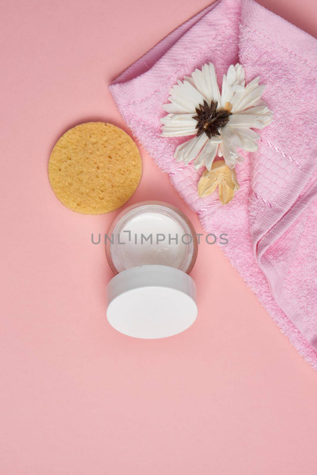 hygiene items skin care aromatherapy pink background by Vichizh