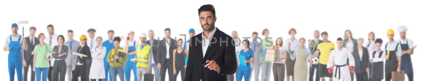 Businessman pointing at you in front of crowd of different industries professions people cooperation job search staff management concept