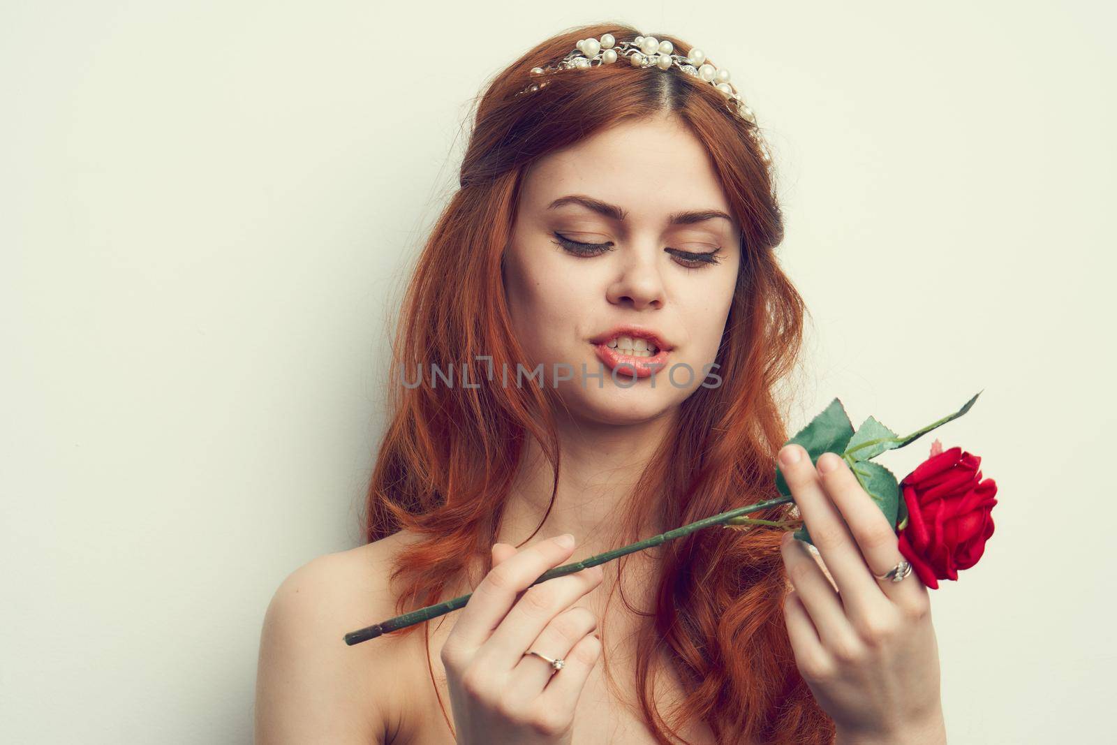 attractive woman with rose flower makeup romance model. High quality photo