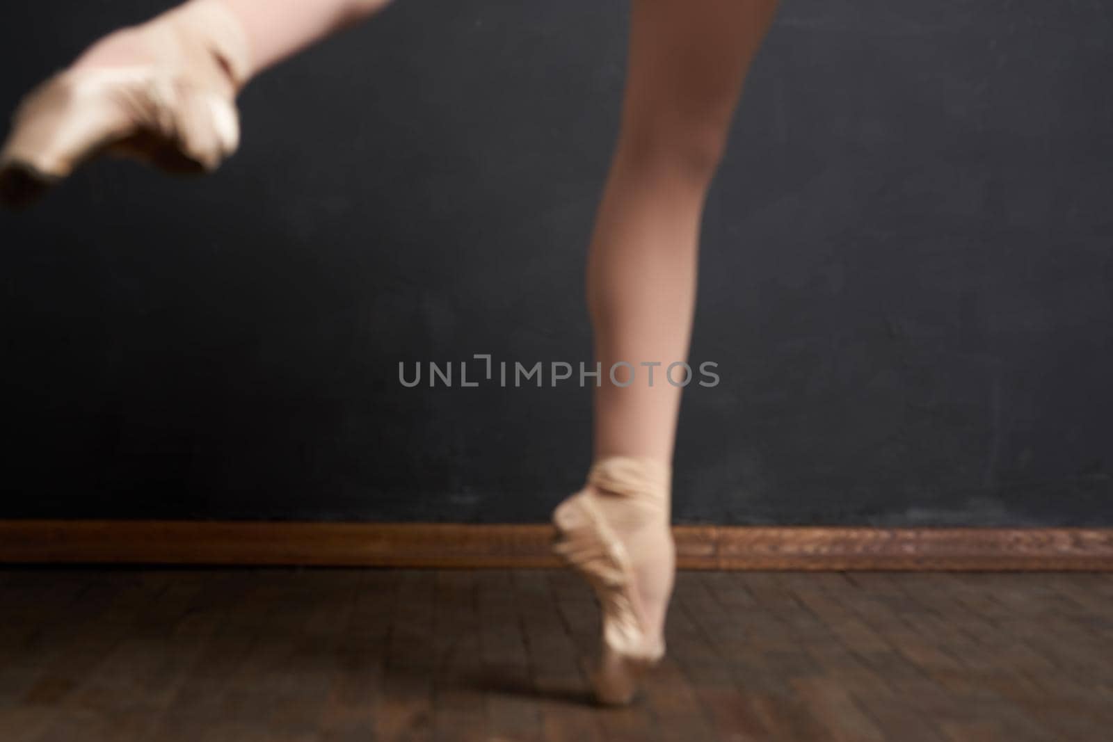 ballerina legs exercise performance classical style close-up. High quality photo