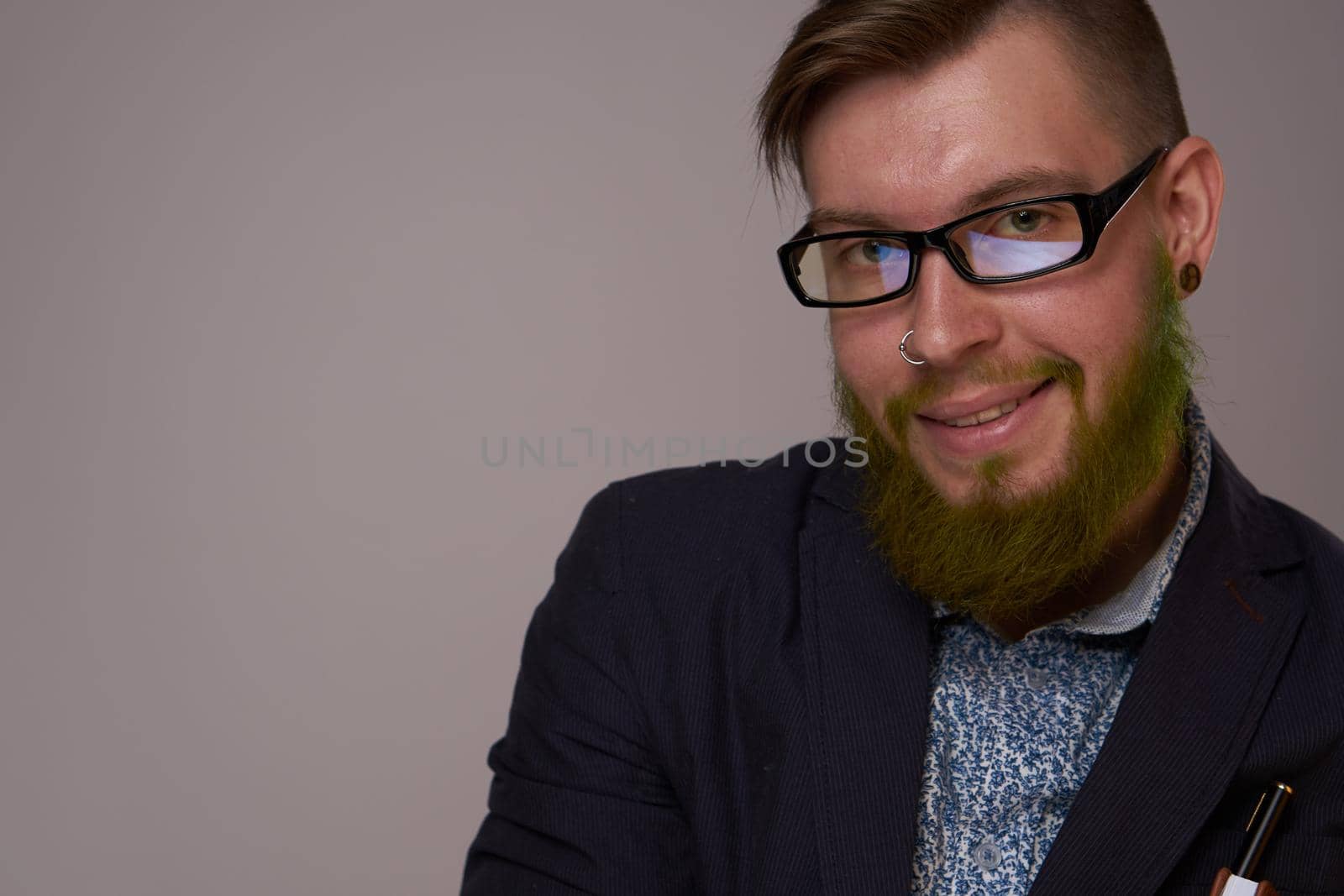 business man with glasses with tattoos on his arms office professionals. High quality photo