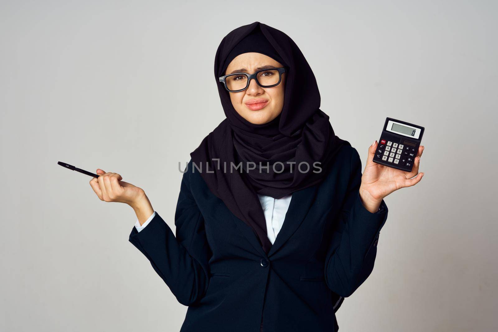 woman in black hijab laptop work technology office. High quality photo