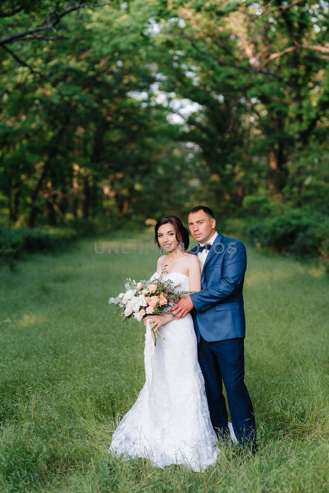 A couple in love a guy and a girl on a walk in the forest belt by Andreua