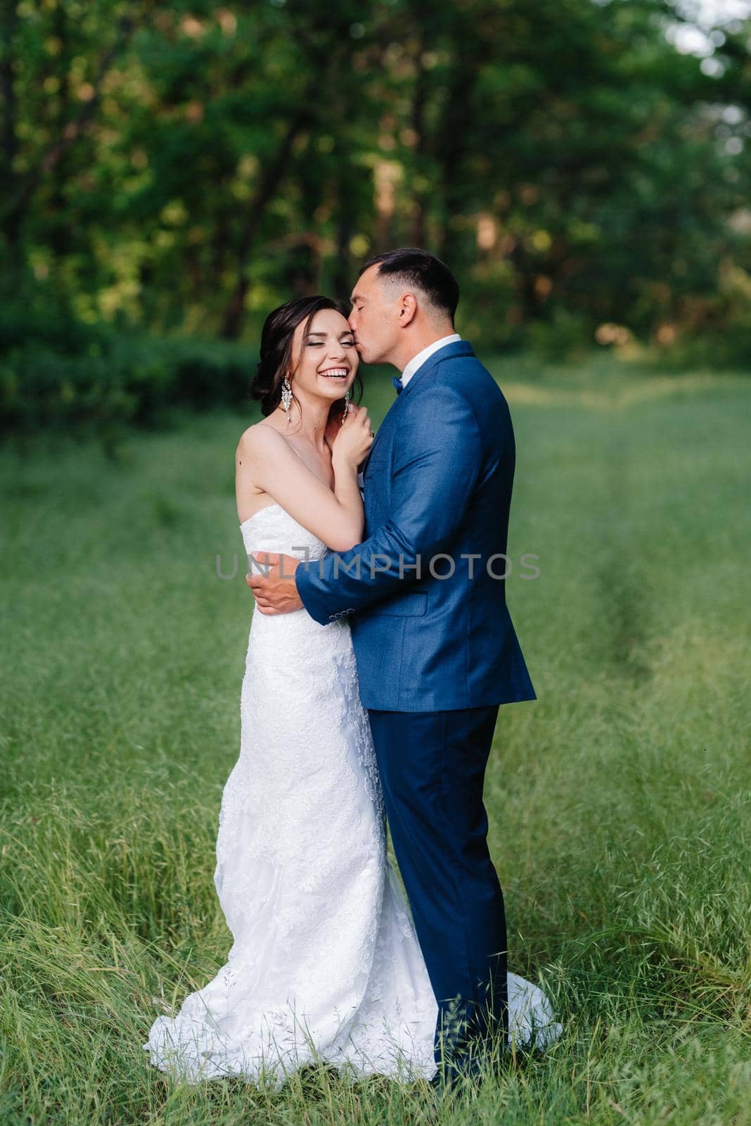 A couple in love a guy and a girl on a walk in the forest belt