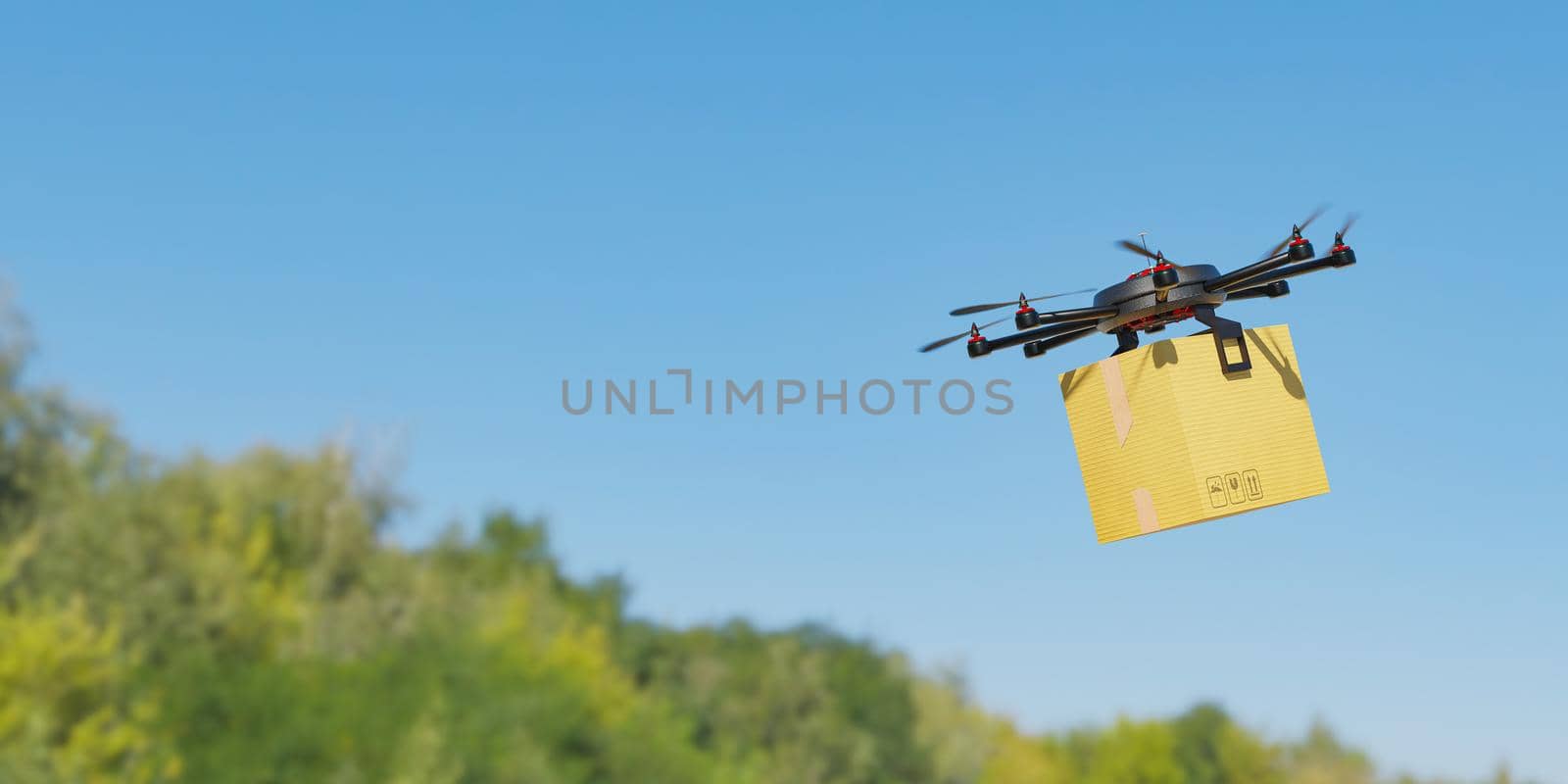 drone flying with a cardboard package with a background of trees out of focus. concept of delivery in rural areas by asolano