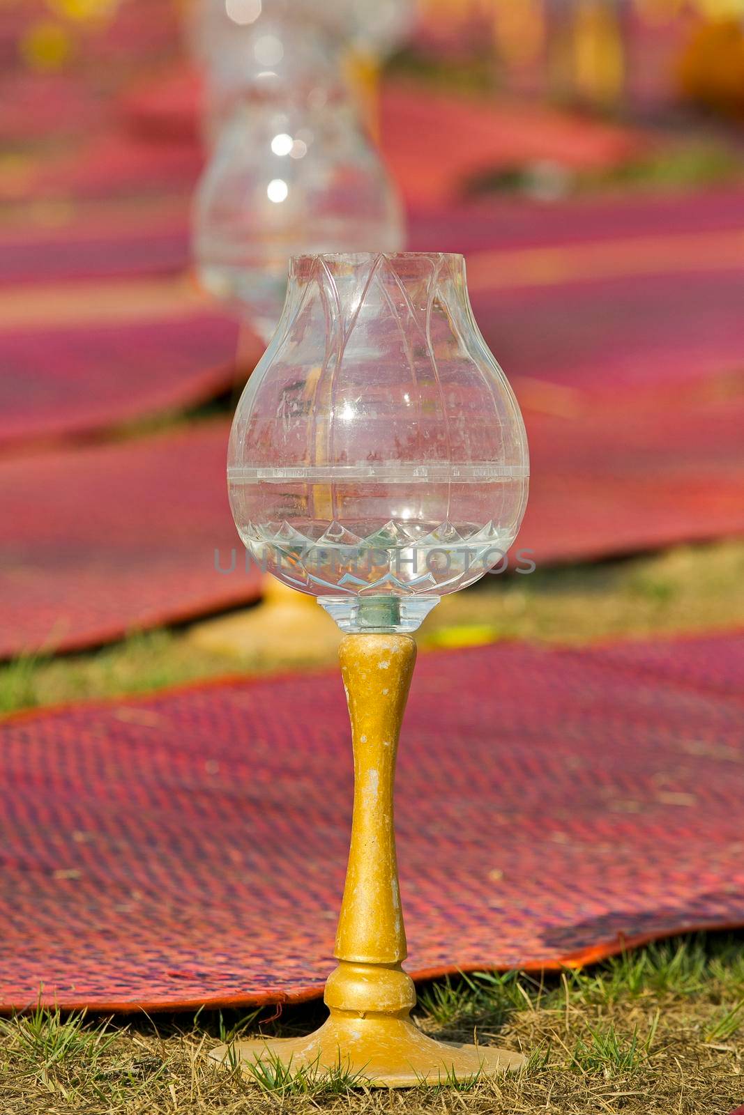 Glass candle holder for candles in Buddhism