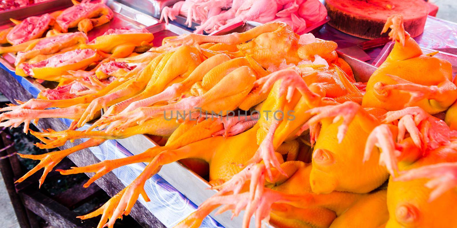 Chicken sold in the market by titipong