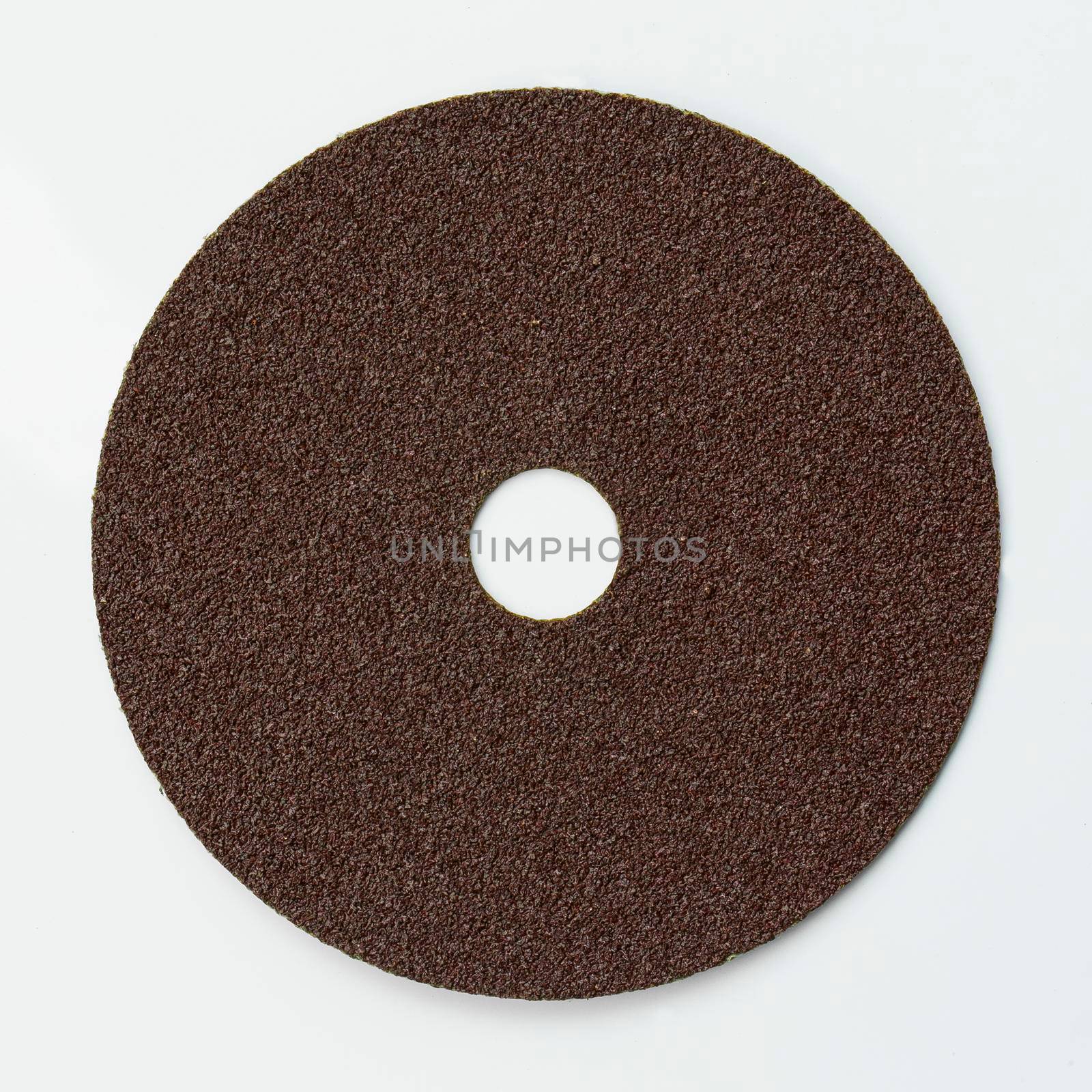 Red grinding wheel on white background