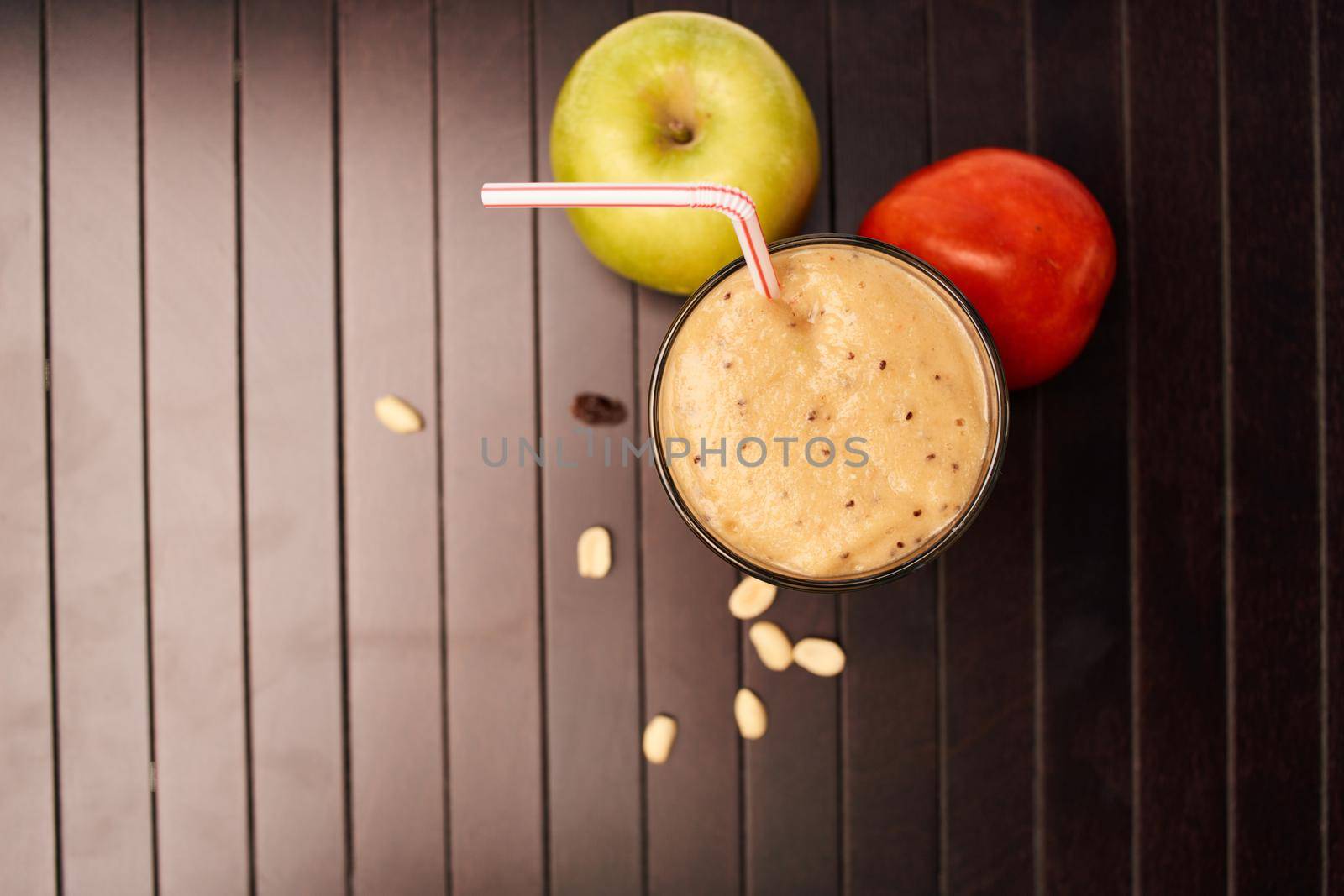 smoothie fruit healthy food cocktail wooden background by Vichizh