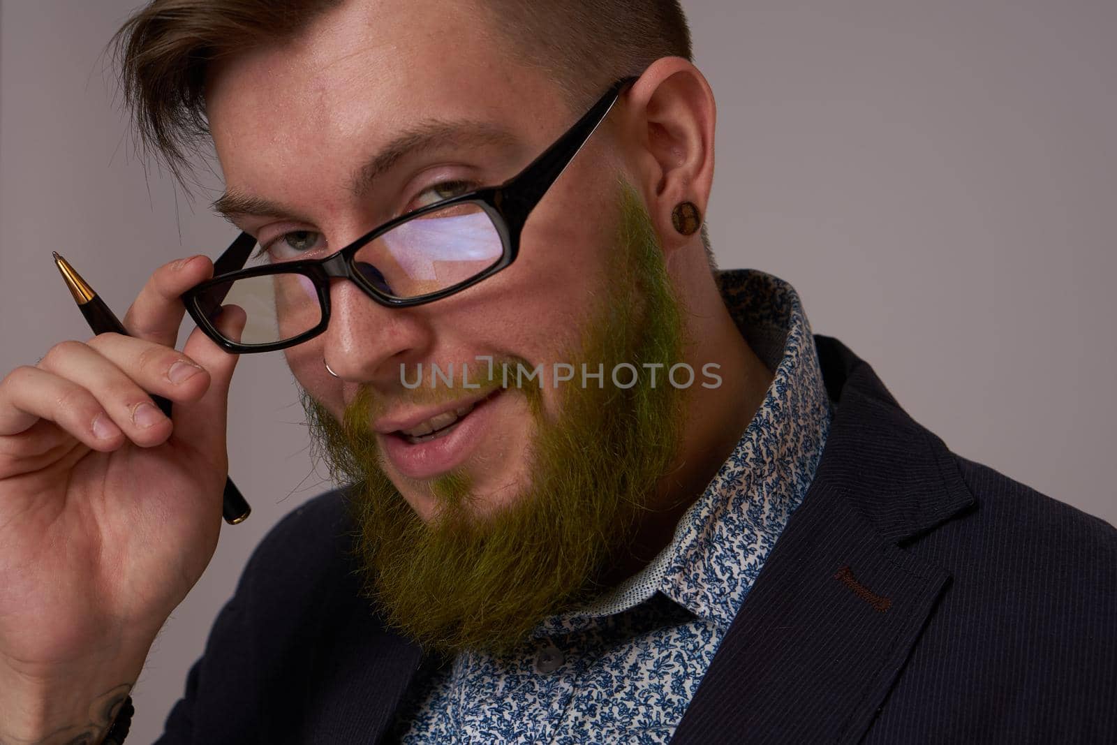 portrait of a business man wearing glasses with a beard posing an official by Vichizh