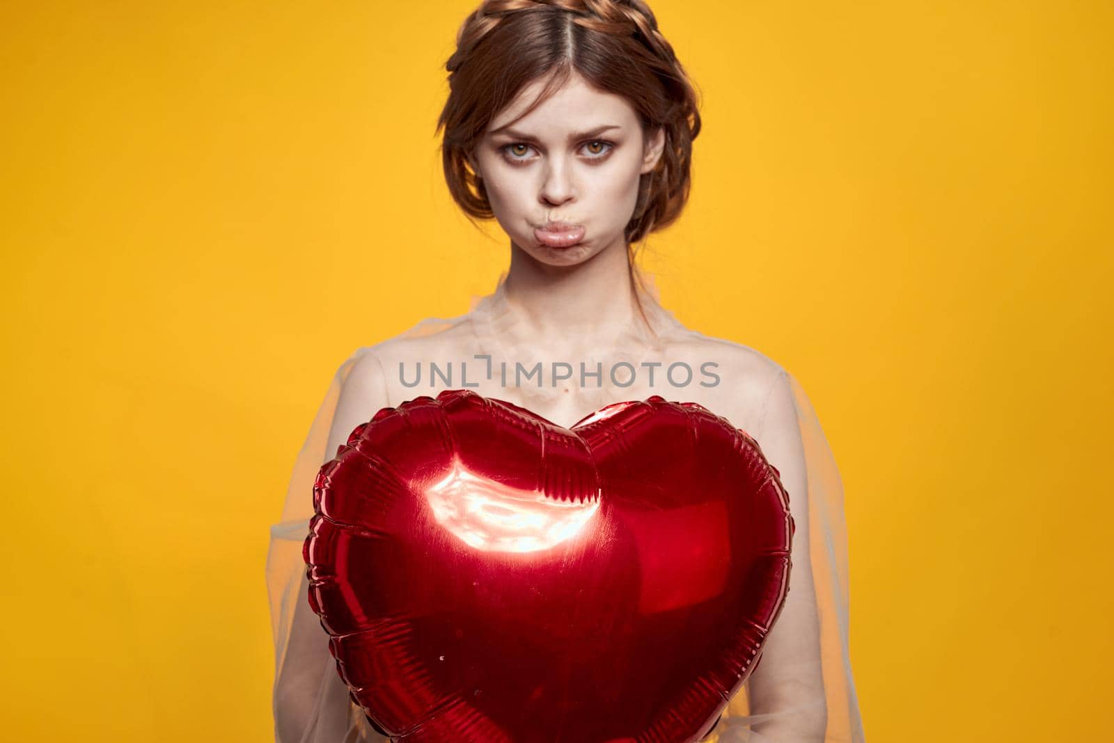 pretty woman Birthday party gift heart balloon isolated background. High quality photo