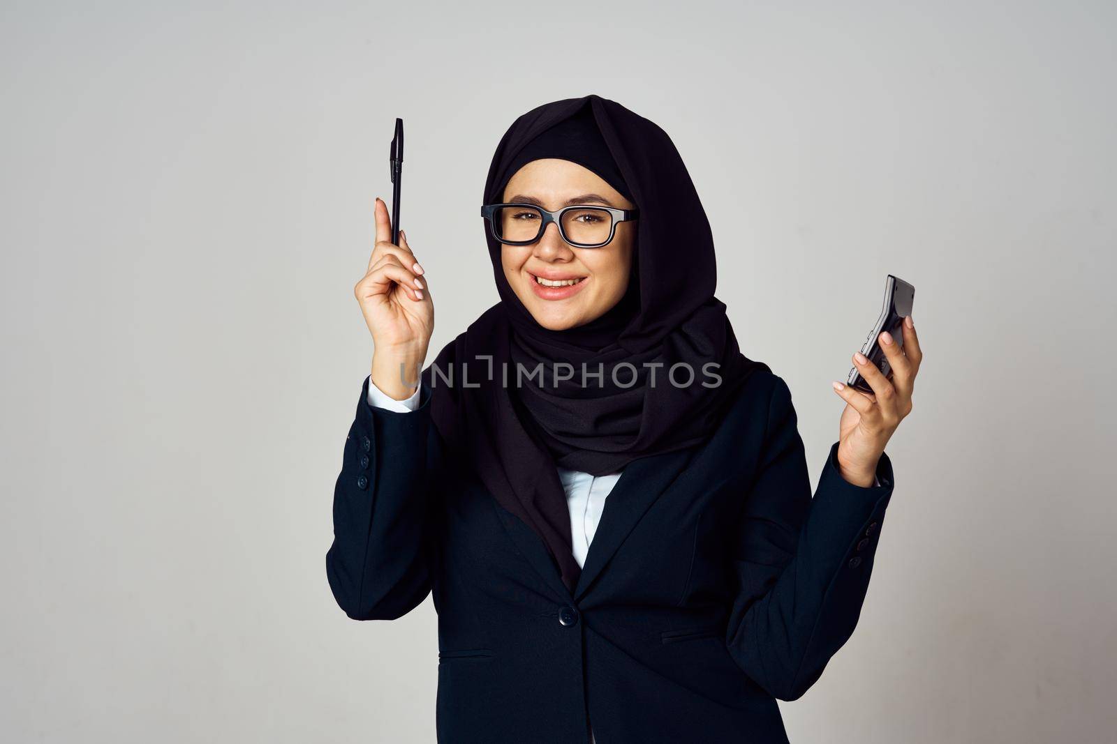 woman in black hijab laptop work technology office by Vichizh