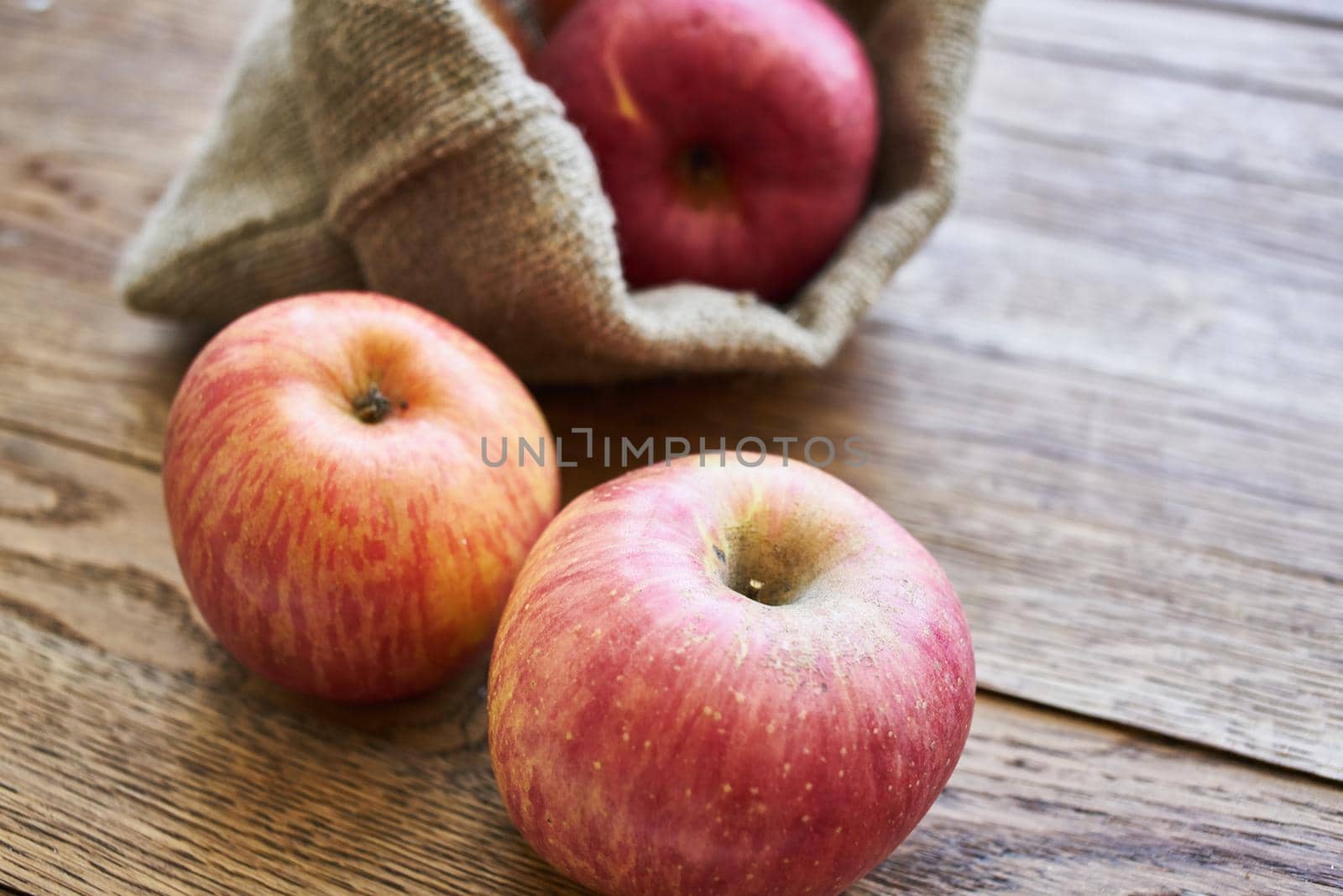 apples on a wooden table vitamins fresh fruits organic. High quality photo