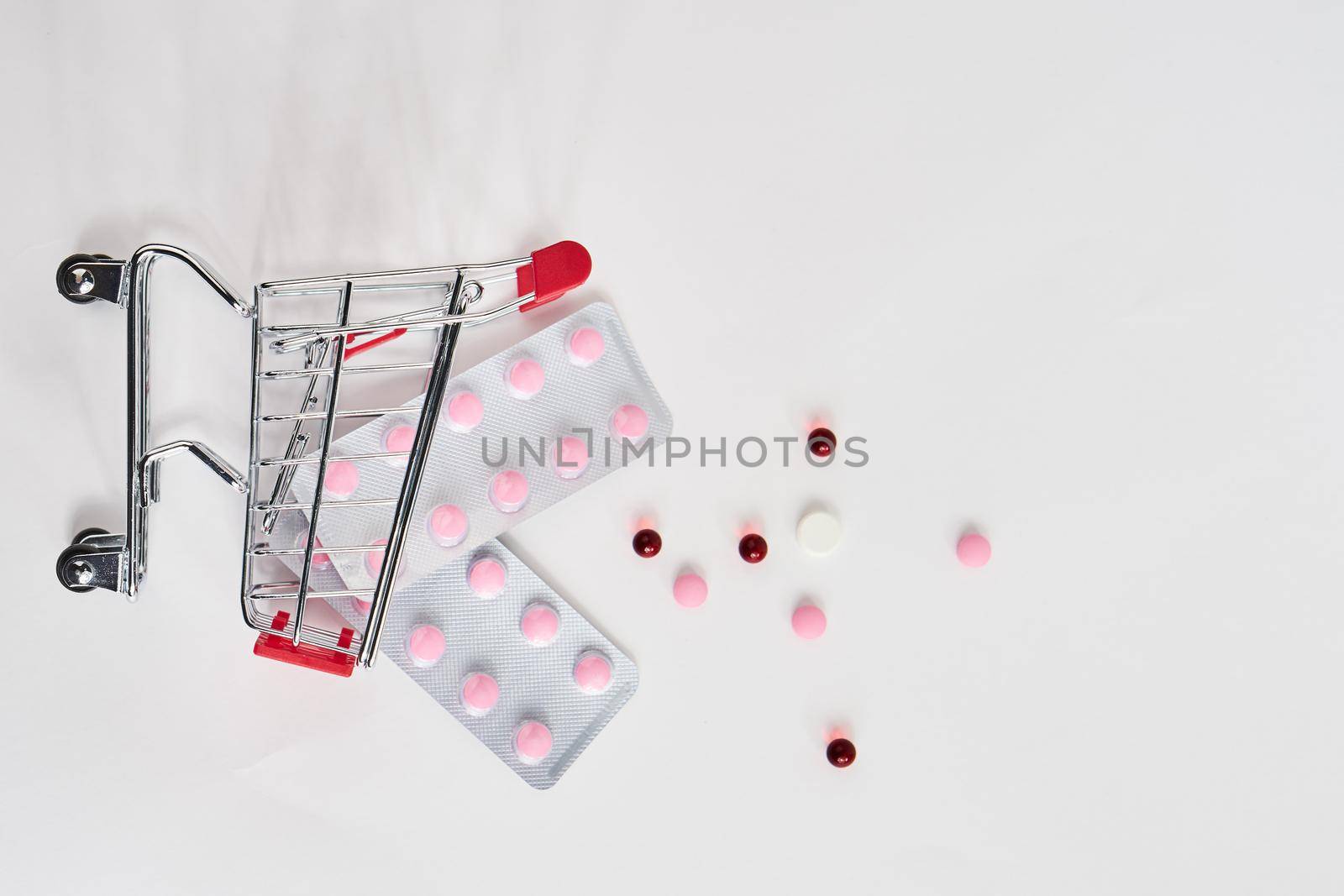 drug trolleys pharmacy shopping light background pharmacy. High quality photo