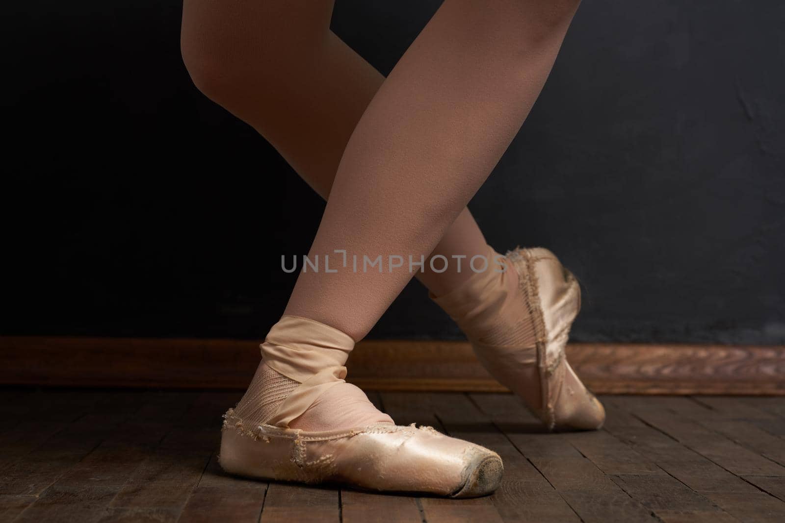 ballerina legs exercise performance classical style close-up. High quality photo