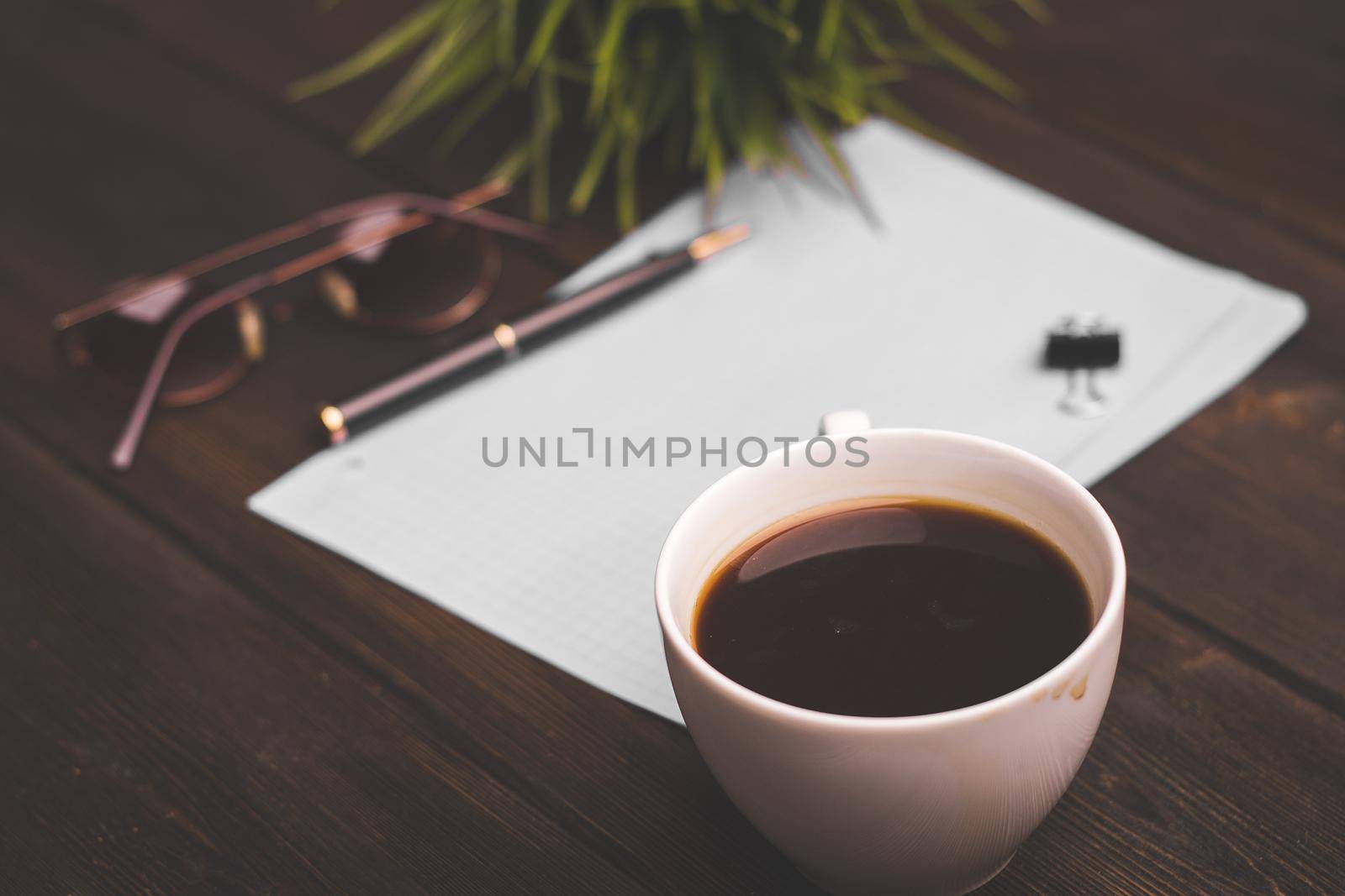 coffee cup notepad with pen learning desk office. High quality photo