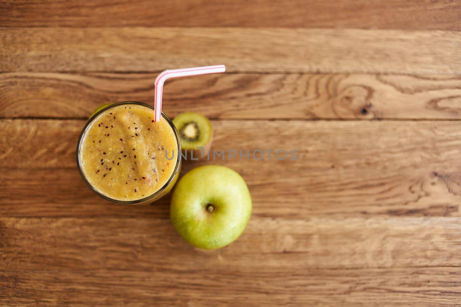 smoothie fresh fruit cocktail dessert healthy food in wooden background. High quality photo