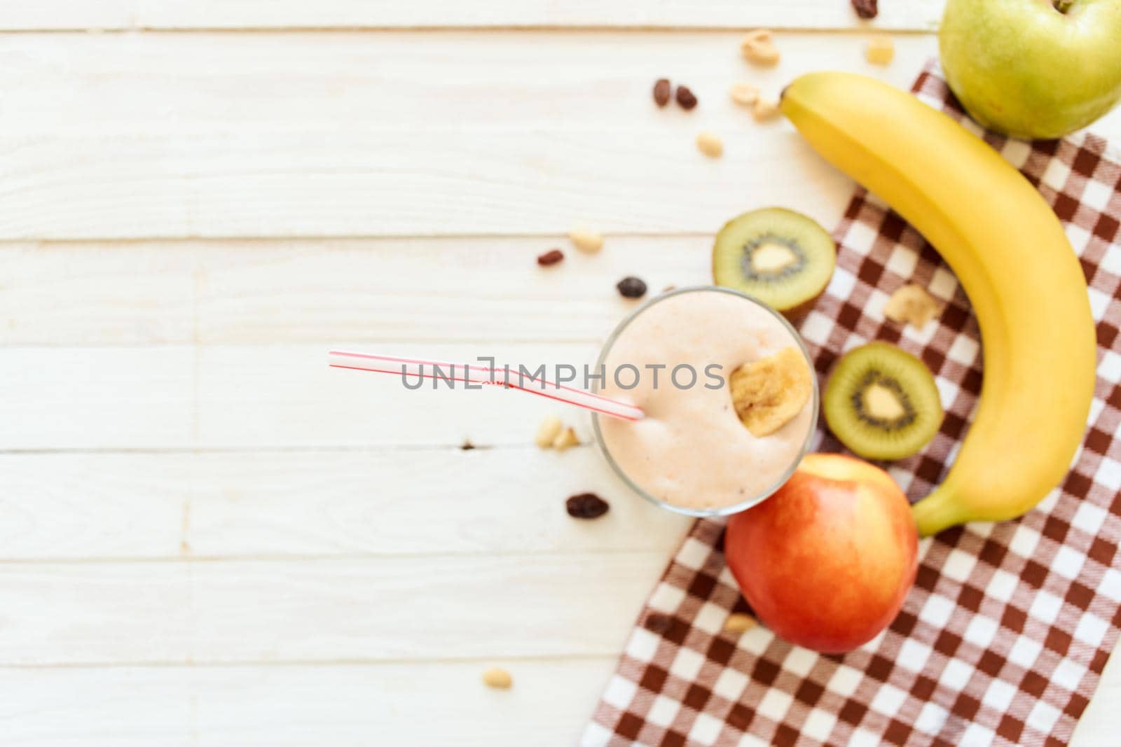 fresh fruit cocktail breakfast dessert organic wood background. High quality photo