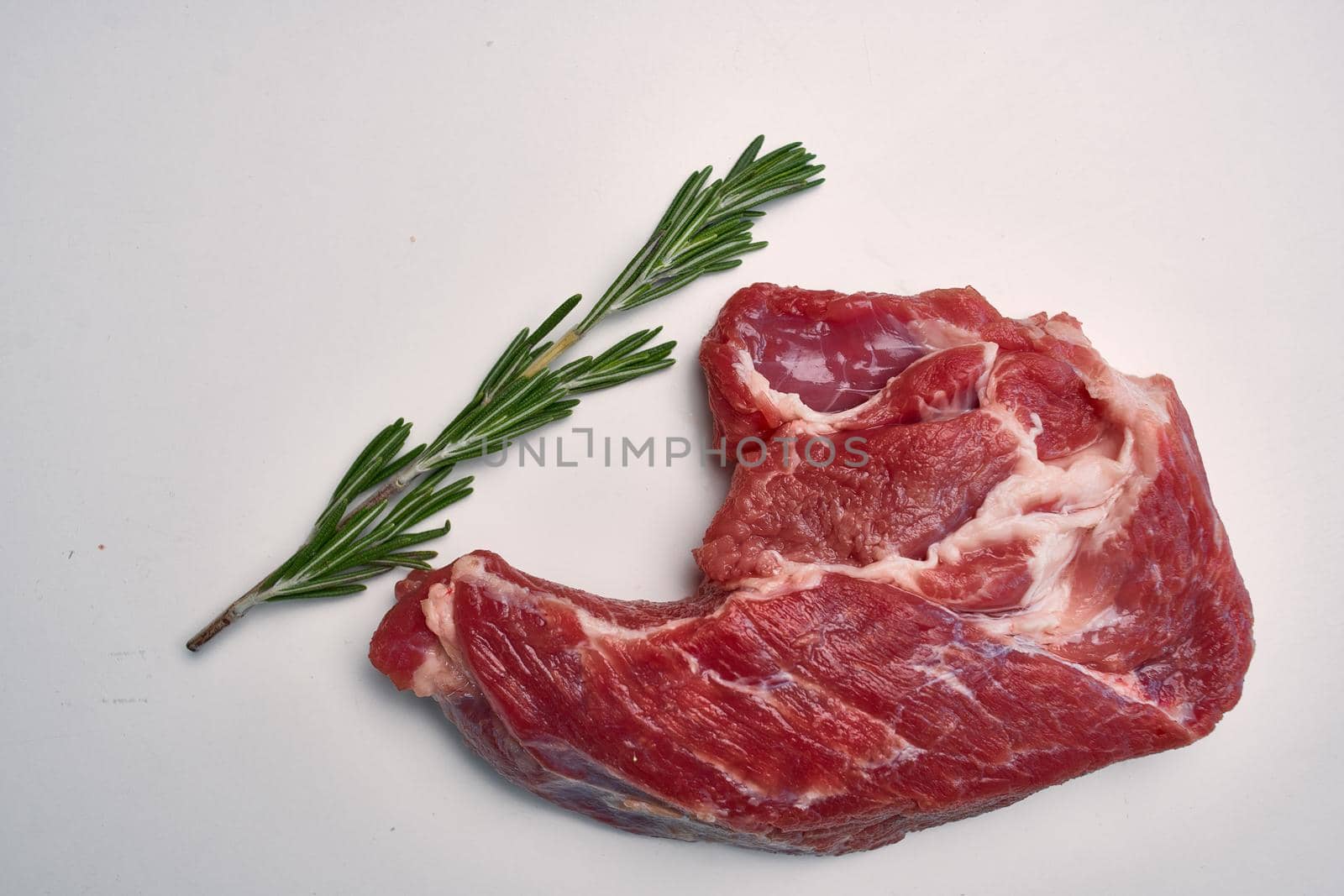 meat steak beef rosemary food yes light background. High quality photo