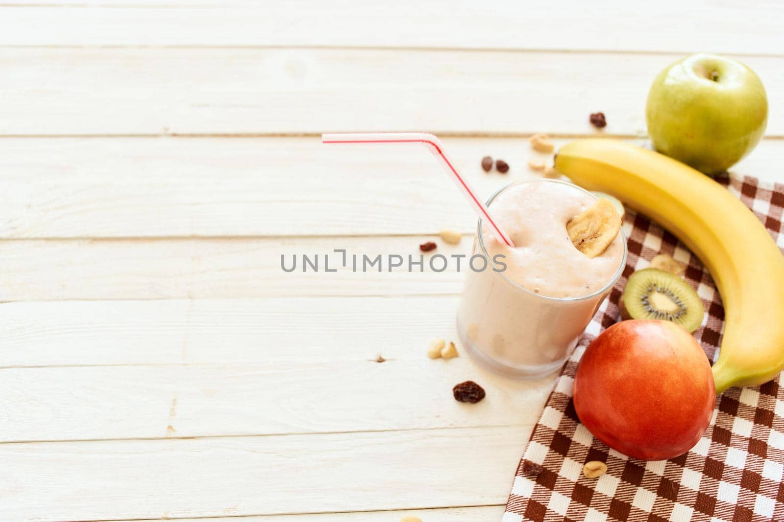 fresh fruit cocktail breakfast dessert organic wood background. High quality photo