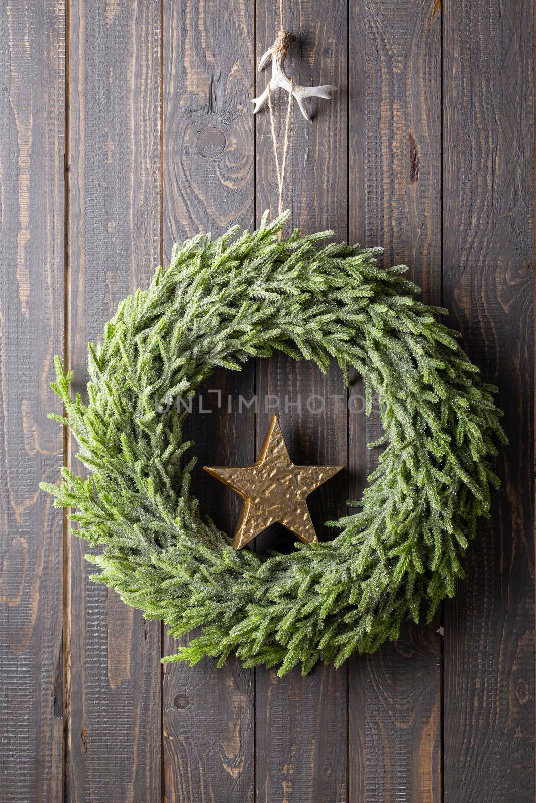 Close up of a Christmas wreath with a decor.