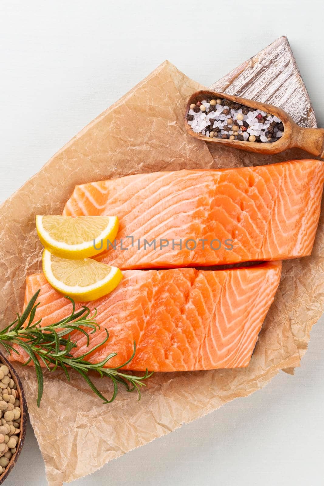 Fresh salmon steak with spinach and lentils.