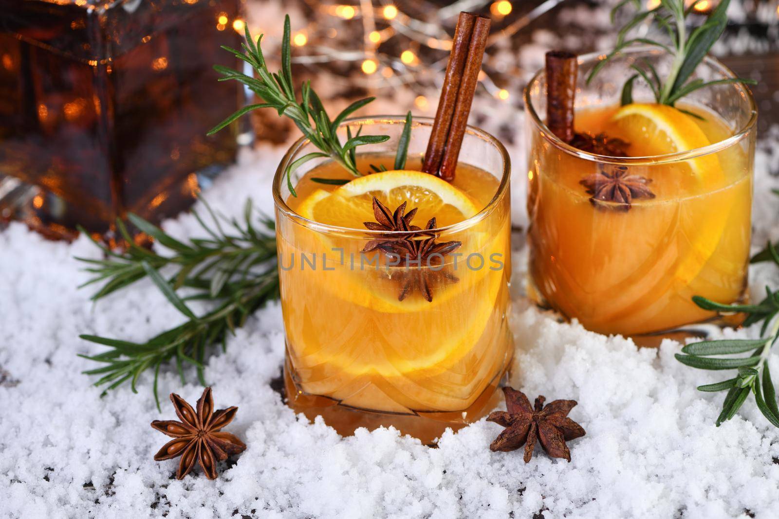 Negroni cocktail. Bourbon with cinnamon with oranges juice and star anise.The perfect cozy cocktail for chilly December evenings.