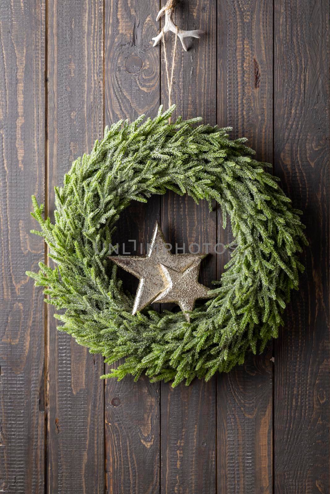 Close up of a Christmas wreath with a decor.