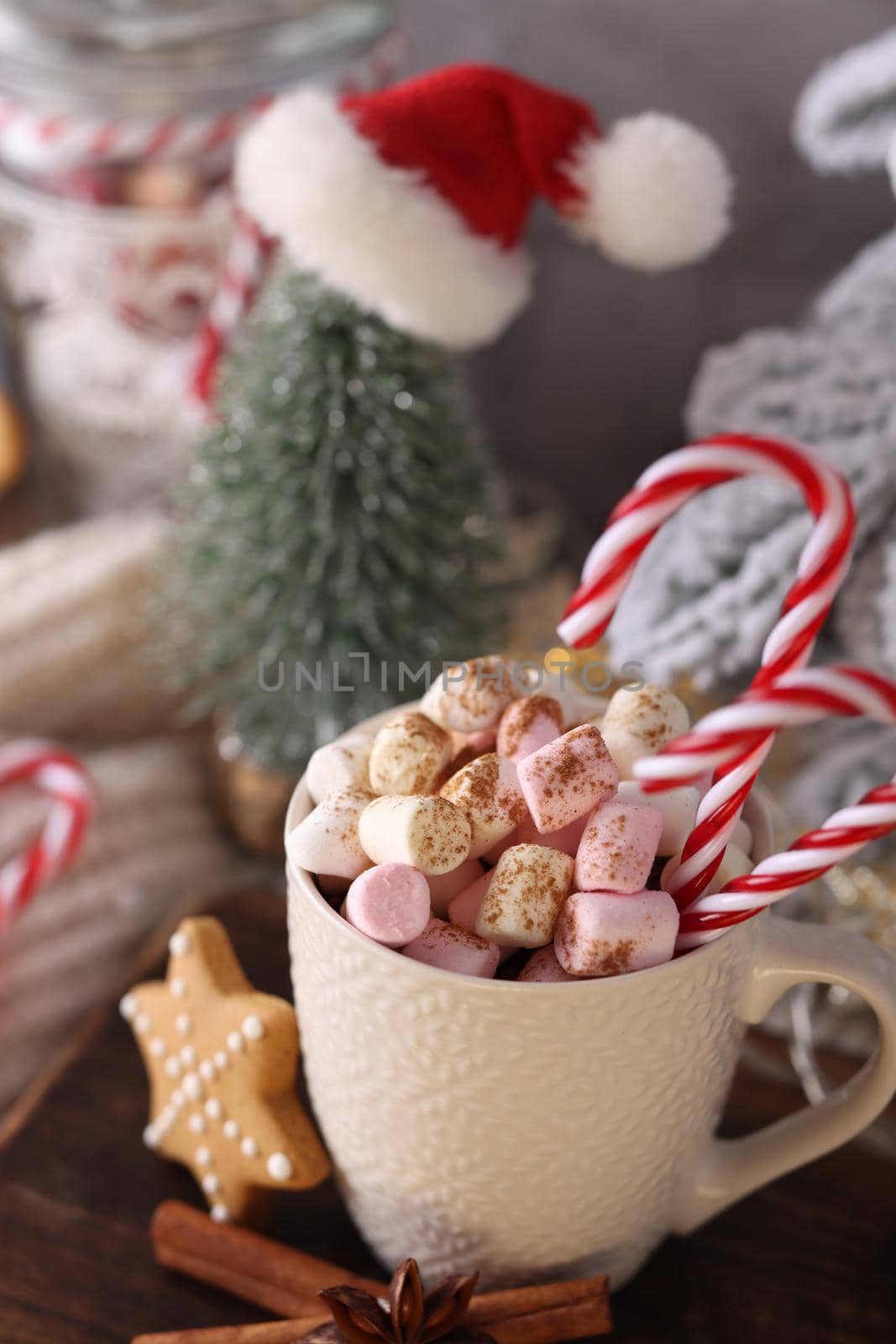 Christmas candy cane heart shape, bokeh background. by gitusik