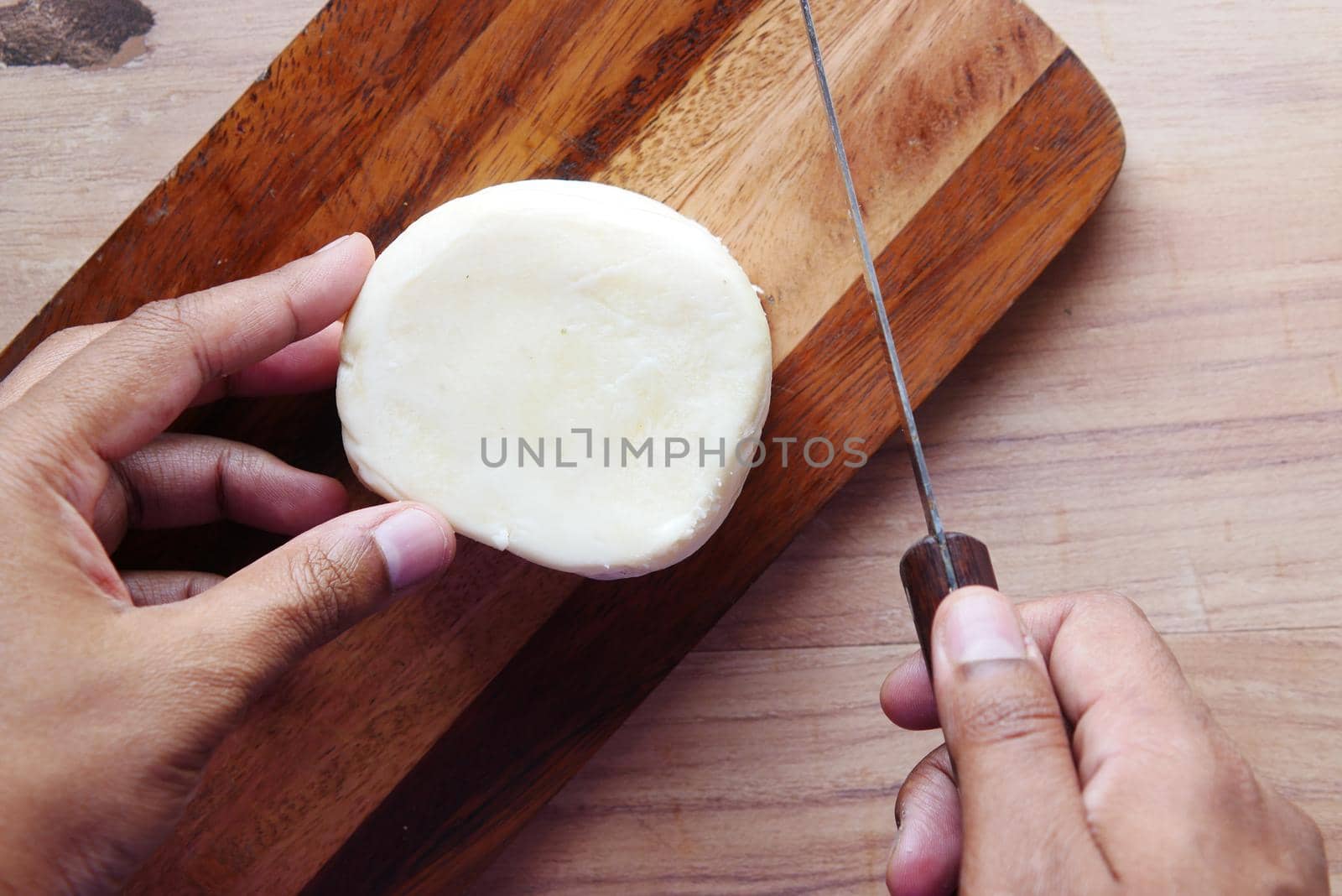 close up of fresh cheese on white background