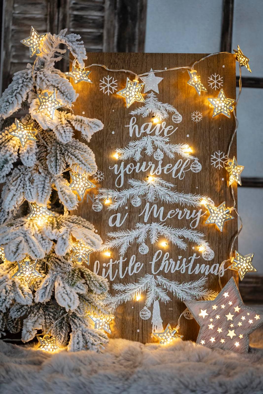 Board with Merry Christmas message on wooden background. by gitusik
