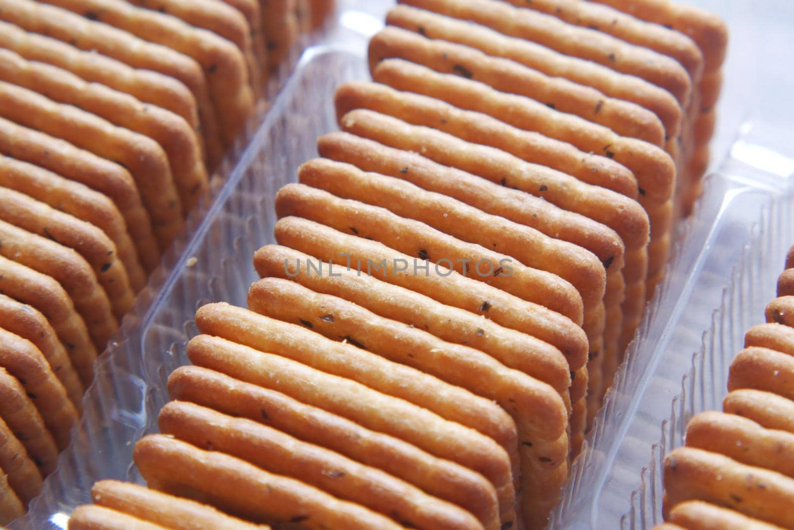 close up of sweet cookies on wooden table .