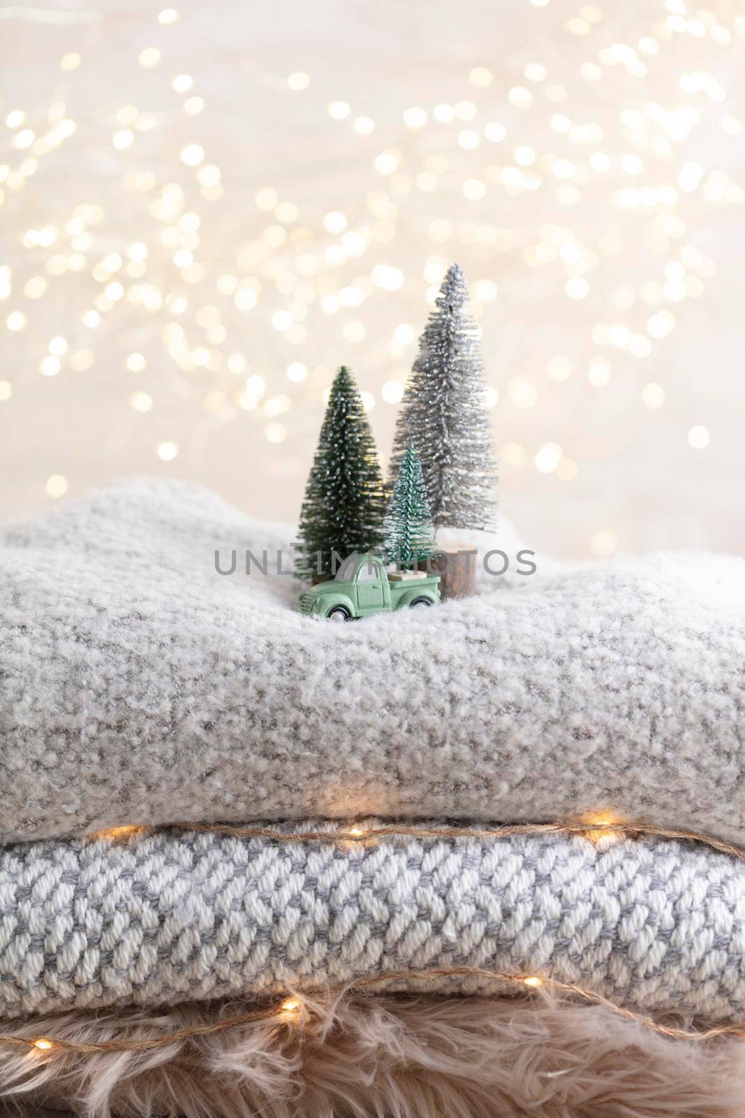 Christmas little trees and golden lights bokeh. by gitusik