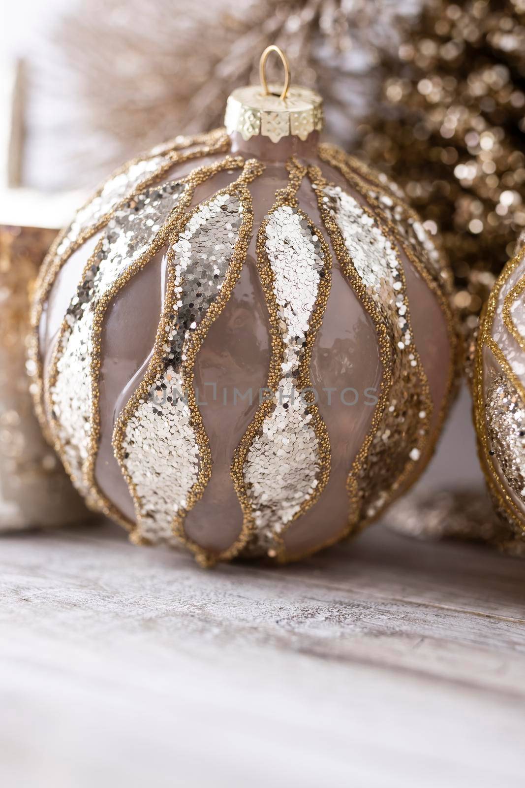 Golden christmas balls with bokeh background. by gitusik