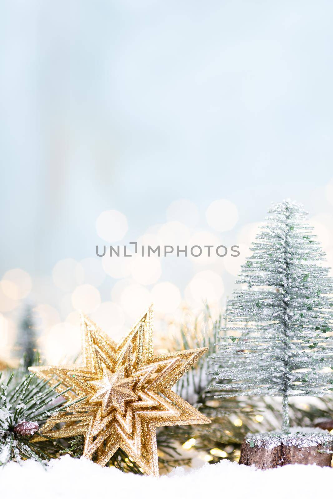Christmas background with tree and blurred shiny lights.