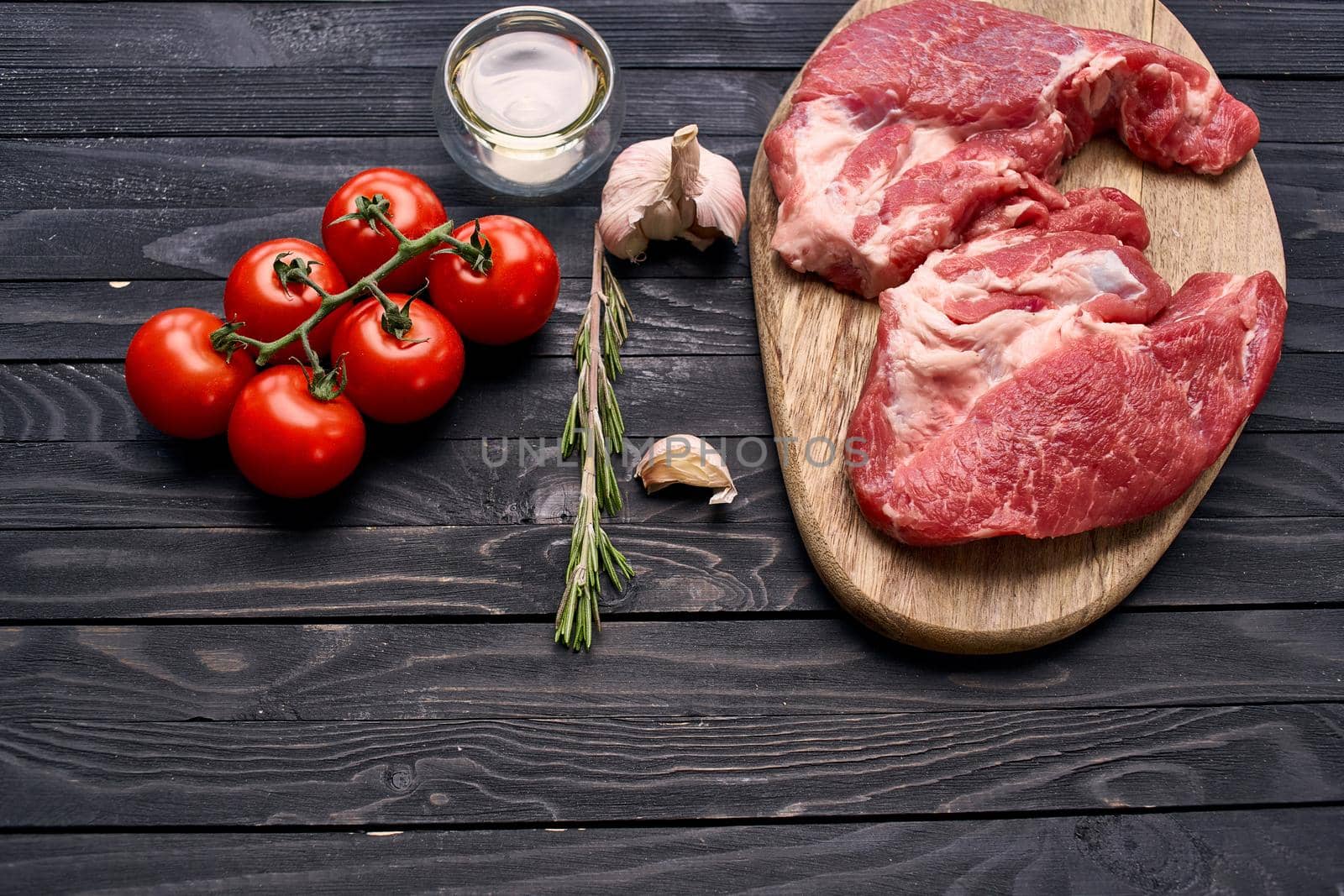 meat steak on wooden board ingredients top view food. High quality photo