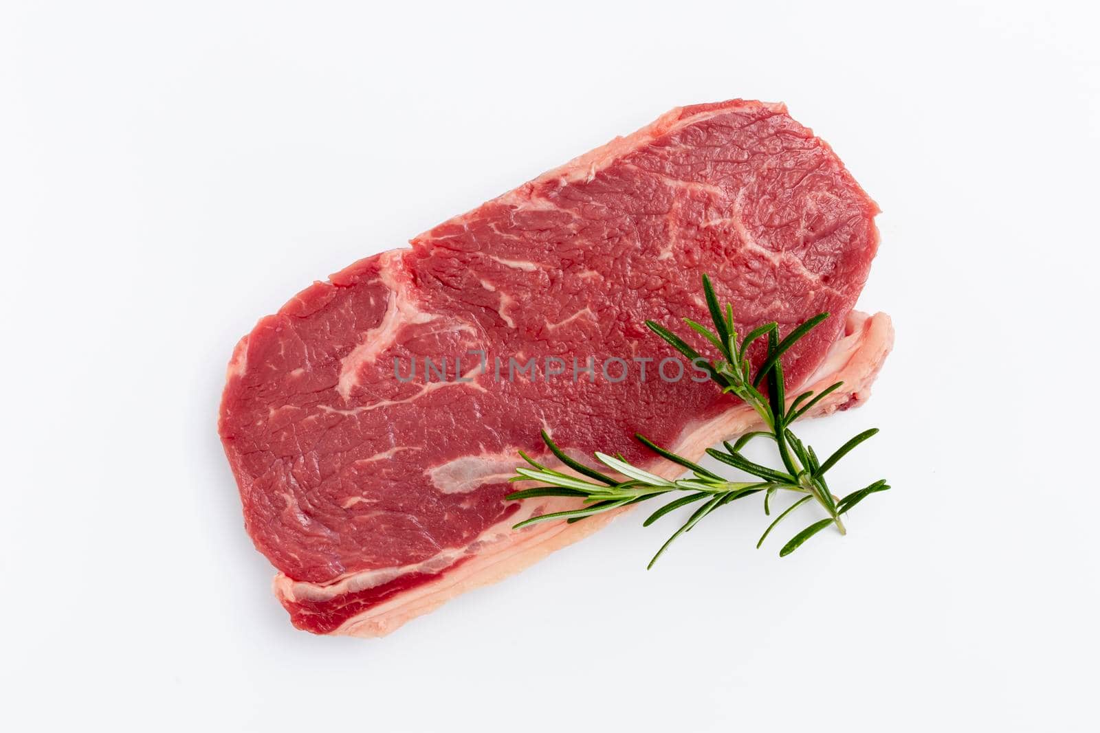 Fresh raw steaks on white background. by gitusik