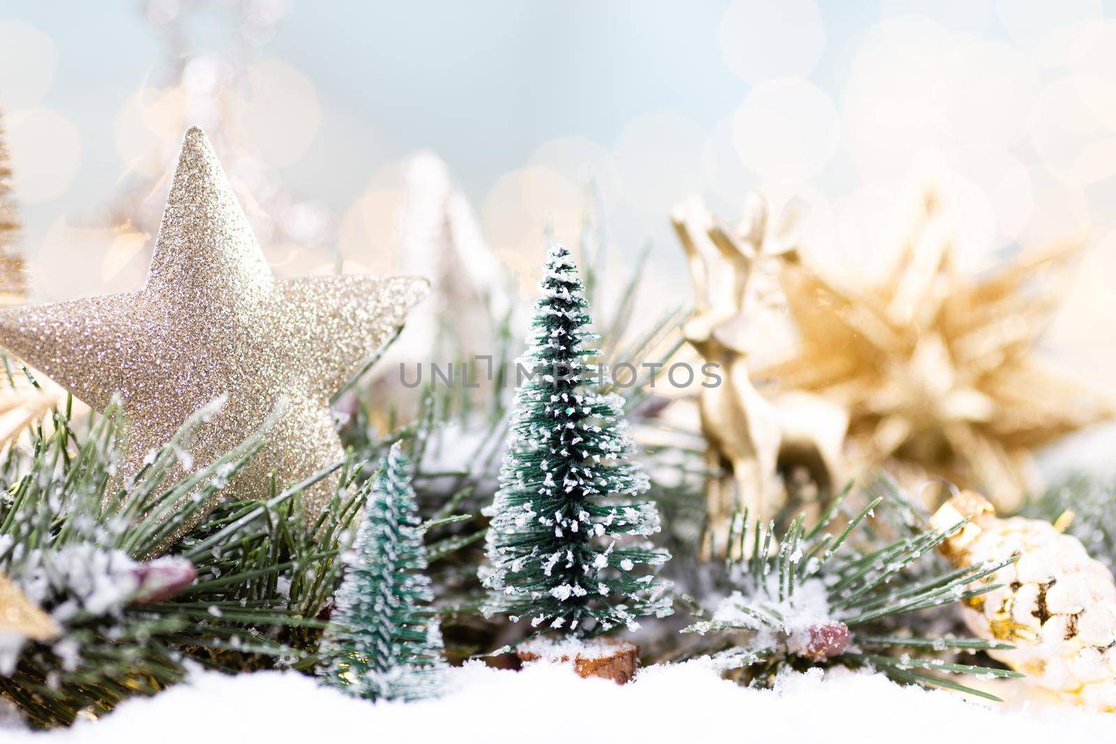 Christmas background with tree and blurred shiny lights.
