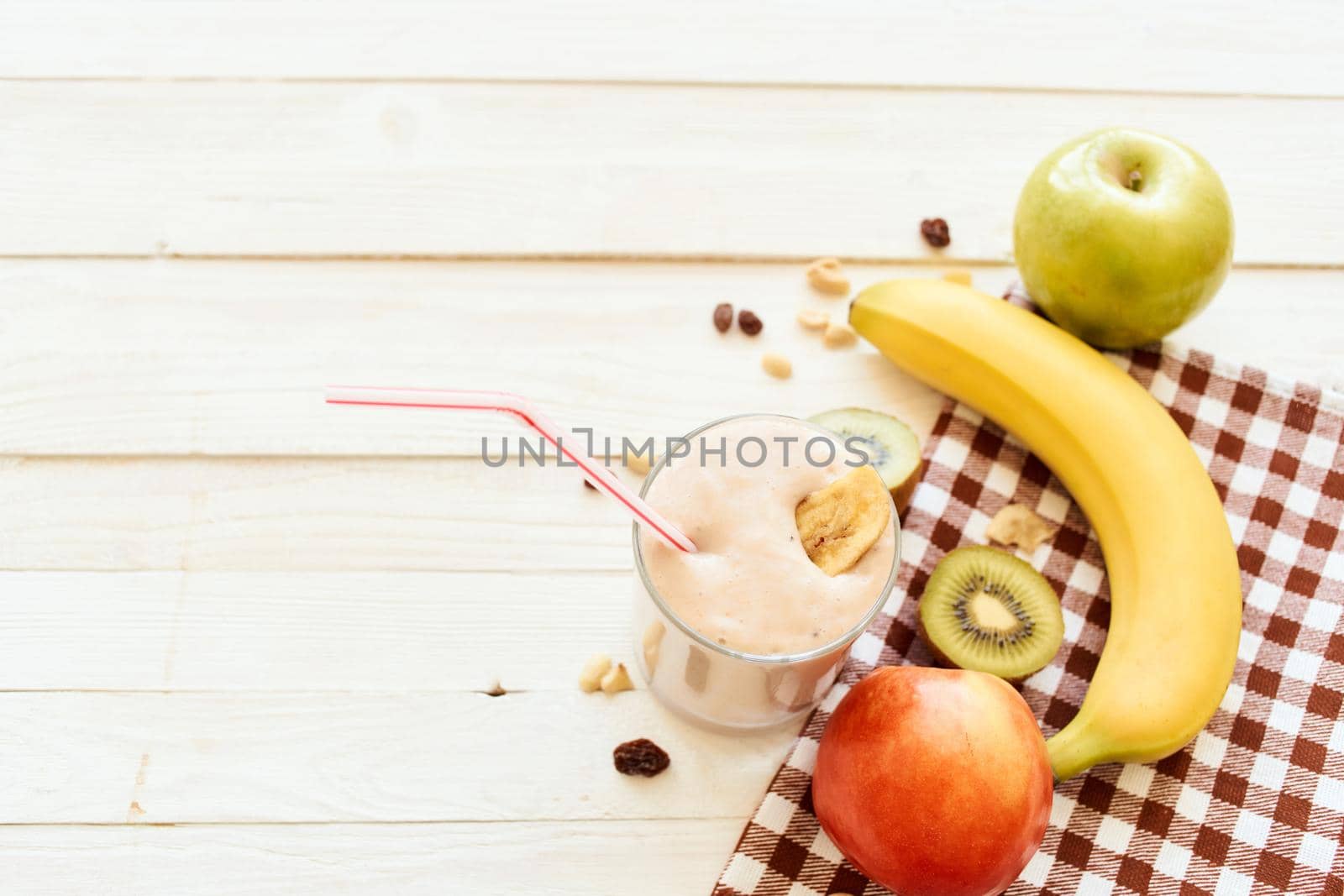 fresh fruit cocktail breakfast dessert organic wood background by Vichizh