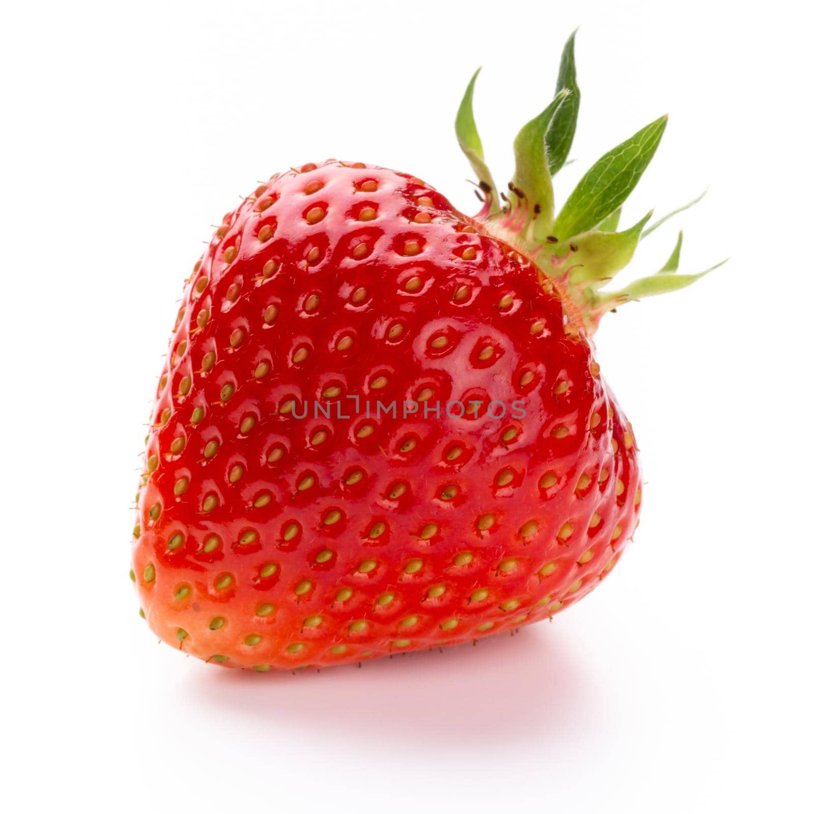Fresh strawberries closeup on a white background. Isolated - Image by gitusik