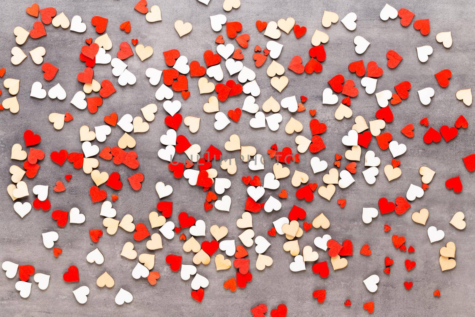 Happy Valentines day background. With small color hearts on gray background. by gitusik