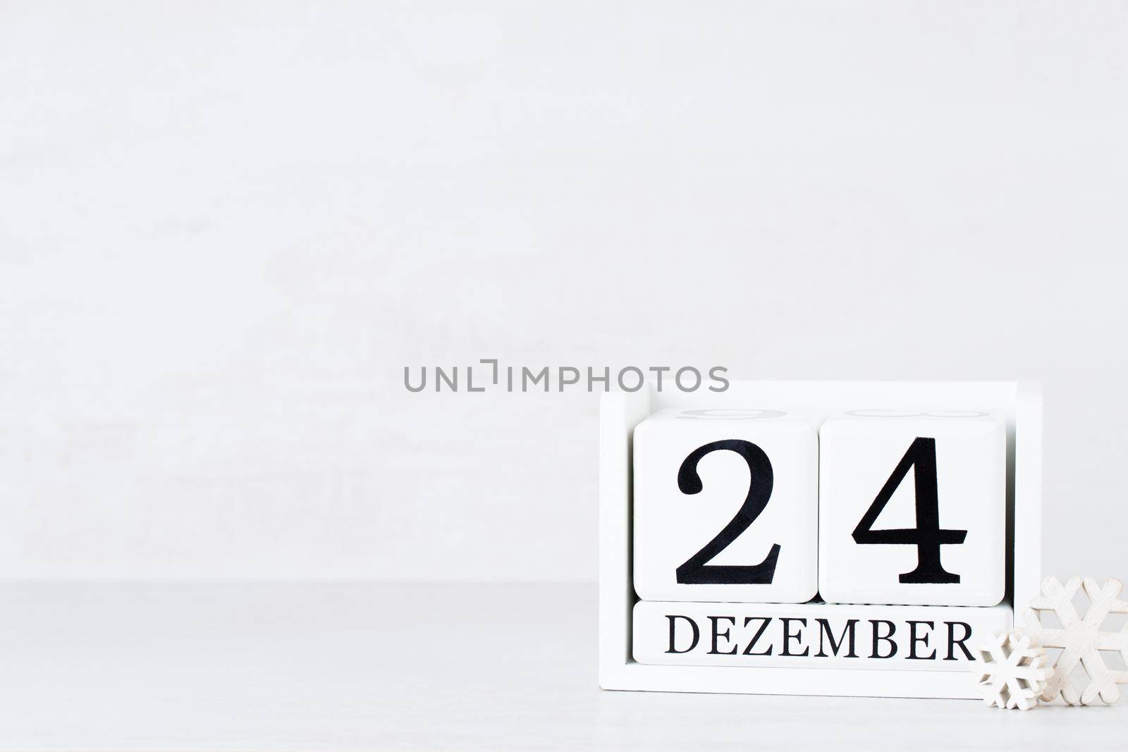 Christmas backgrounds. Christmas calendar, 24 december on the gray background. by gitusik