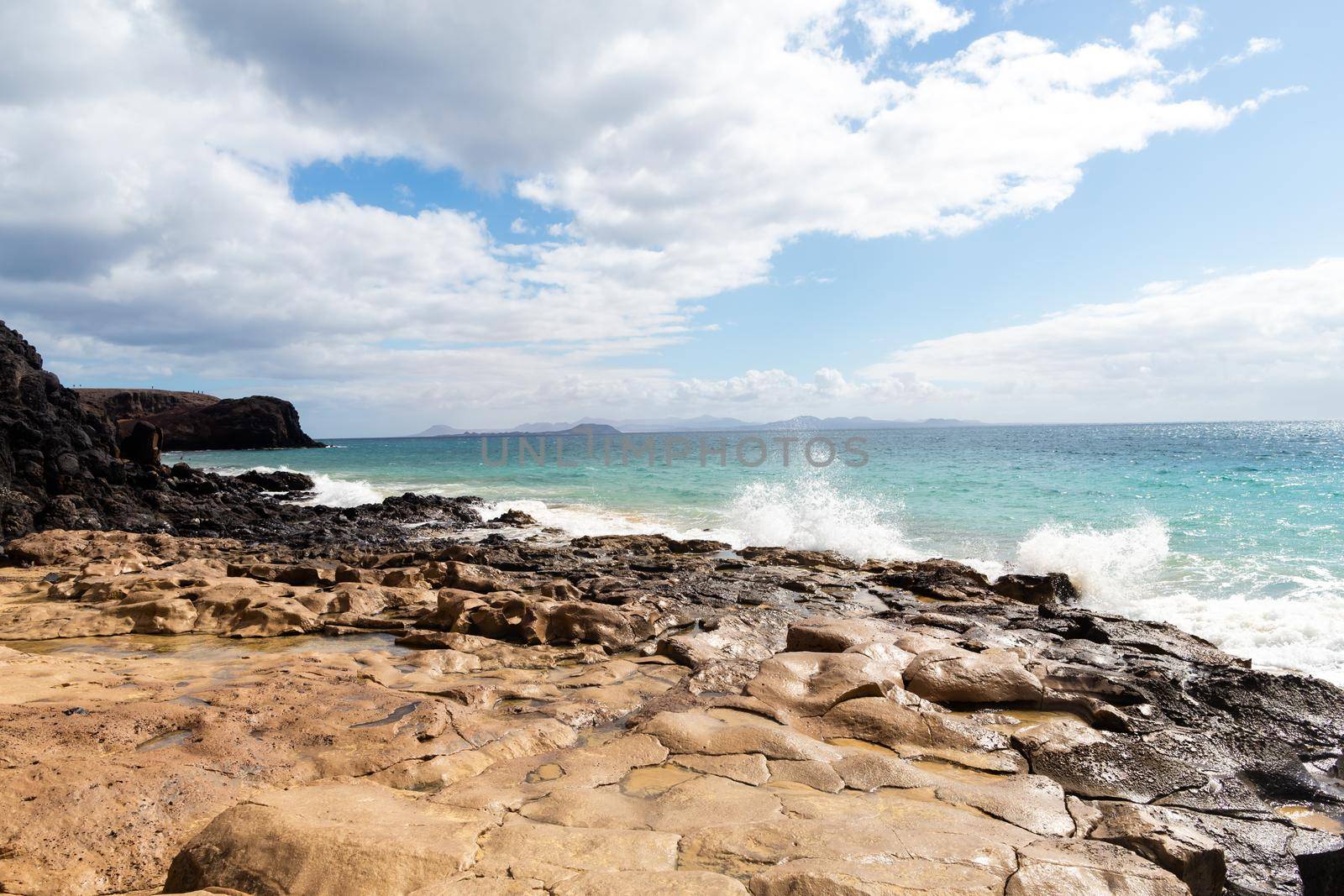 Panorama of beautiful beach and tropical sea of Lanzarote. Canaries by gitusik