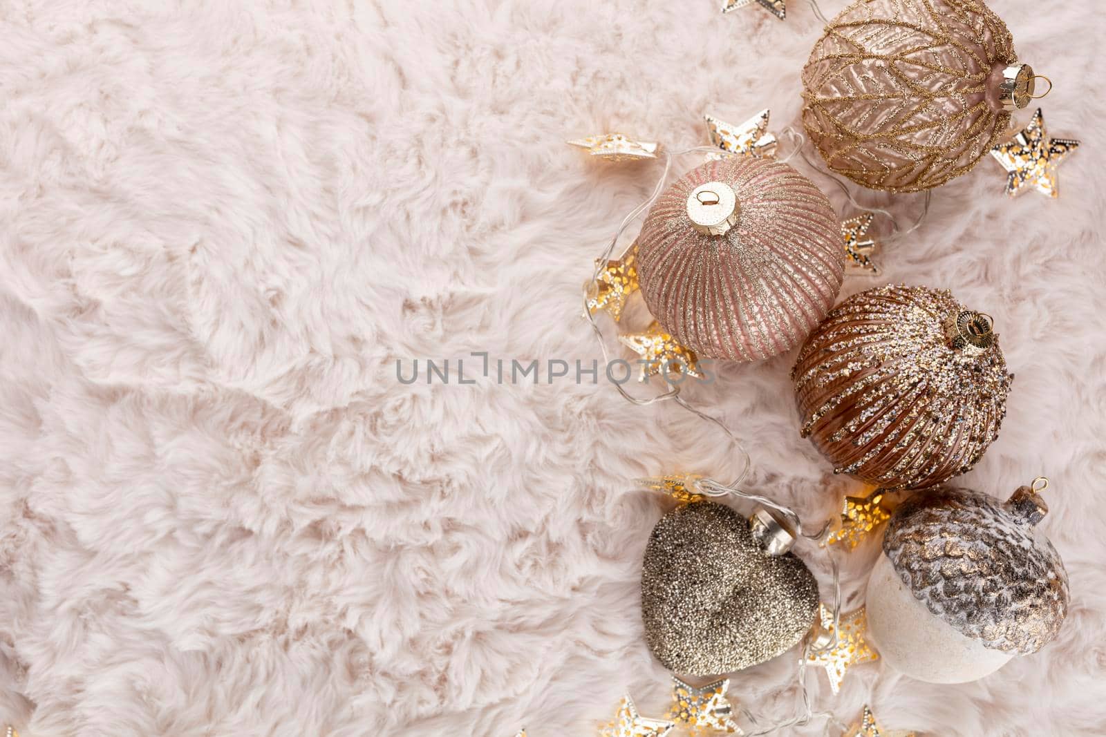 Golden christmas balls with wool background. by gitusik