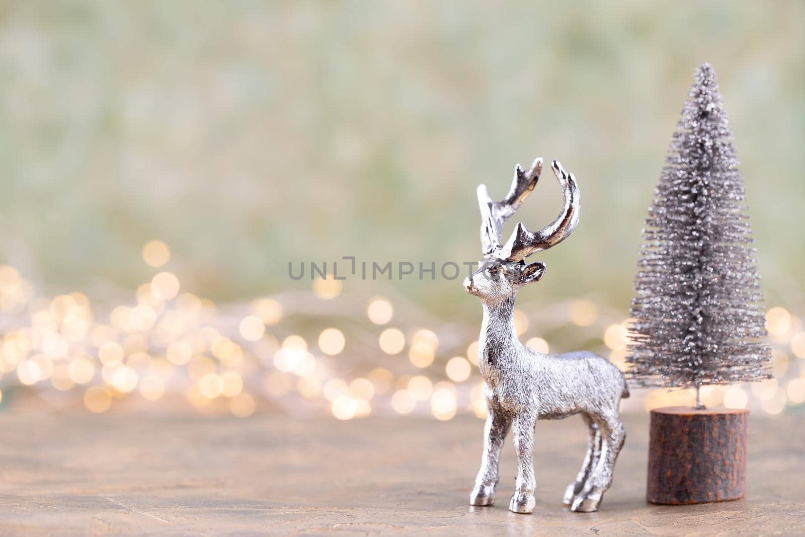 Christmas tree on silver, bokeh background. by gitusik