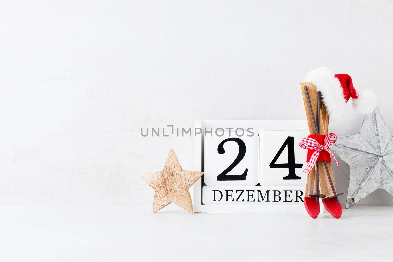 Christmas backgrounds. Christmas calendar, 24 december on the gray background. by gitusik