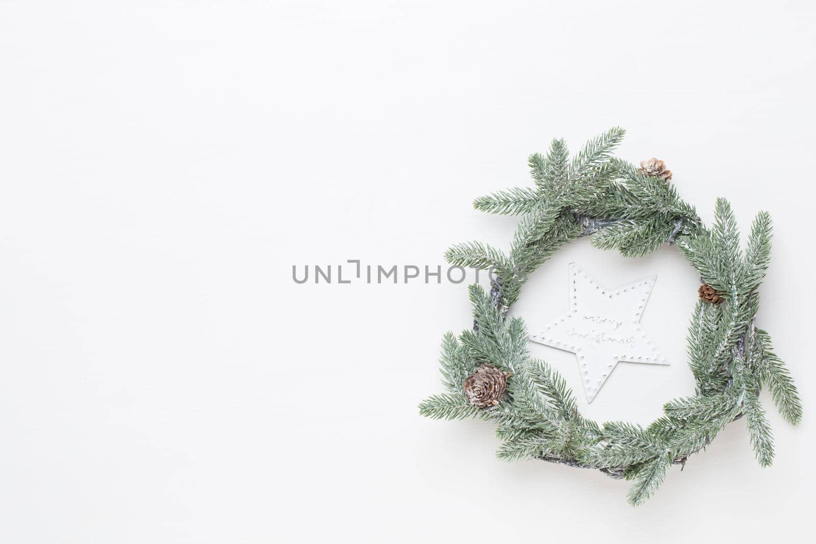 Christmas wreath. Christmas decorations on white background. Flat lay, top view by gitusik